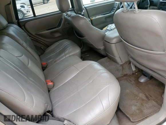 2003 Jeep Grand Cherokee Laredo with VIN 1J4GX48S13C609036, listed as a Copart auction lot 63143505 with 127,188 mi miles and Clean title. Bid and sale history available at DreamBid. Image 11.