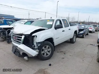 2012 GMC Sierra 1500 SLE with VIN 3GTP2VE7XCG124143, listed as a IAAI auction lot 41806110 with 118,145 mi miles. Bid and sale history available at carsss.com. Image 2.