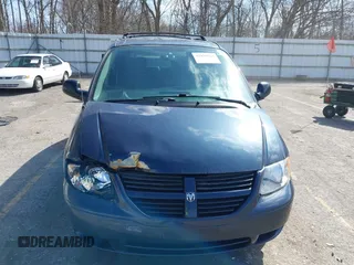 2007 Dodge Caravan SXT with VIN 1D4GP45R07B161443, listed as a IAAI auction lot 41829566 with 83,810 mi miles and . Bid and sale history available at carsss.com. Image 12.
