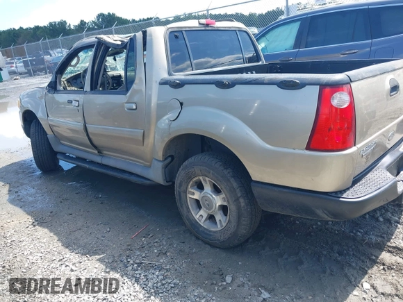 2003 Ford Explorer Sport Trac XLS z VIN 1FMZU77E23UC35868, wystawiony jako IAAI lot #42530211 z przebiegiem 223 483 mil mil oraz . Historia ofert i sprzedaży dostępna na DreamBid. Obrazek 3.