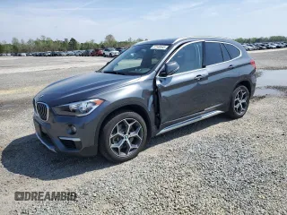 2018 BMW X1 xDrive28i with VIN WBXHT3C36J5L33585, listed as a Copart auction lot 51148545 with 32,091 mi miles and Salvage Title. Bid and sale history available at carsss.com. Image 1.