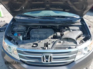 2013 Honda Odyssey Touring with VIN 5FNRL5H98DB080296, listed as a IAAI auction lot 42461843 with 104,901 mi miles and . Bid and sale history available at DreamBid. Image 10.