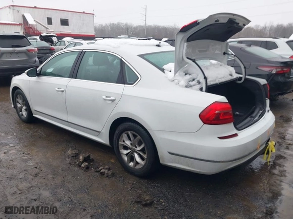 2016 Volkswagen Passat 1.8T S with VIN 1VWAT7A33GC022268, listed as a IAAI auction lot 41551542 with 124,588 mi miles. Bid and sale history available at carsss.com. Image 3.