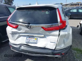 2017 Honda CR-V Touring with VIN 2HKRW1H96HH517669, listed as a IAAI auction lot 41653040 with 97,961 mi miles. Bid and sale history available at carsss.com. Image 17.