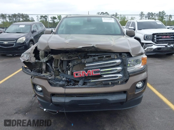 2015 GMC Canyon 2WD SLE with VIN 1GTG5BE38F1229799, listed as a IAAI auction lot 41944801 with 71,165 mi miles. Bid and sale history available at carsss.com. Image 12.