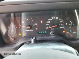 2004 Jeep Wrangler X with VIN 1J4FA39S74P763492, listed as a Copart auction lot 54664095 with 168,493 mi miles and Salvage Title. Bid and sale history available at DreamBid. Image 9.