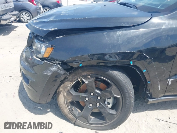 2021 Jeep Grand Cherokee Laredo E z VIN 1C4RJEAG9MC740244, wystawiony jako IAAI lot #42112847 z przebiegiem 32 897 mil mil oraz . Historia ofert i sprzedaży dostępna na DreamBid. Obrazek 6.