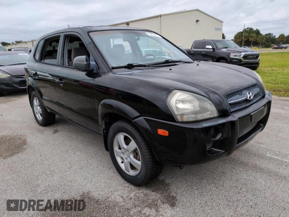 2005 Hyundai Tucson GL with VIN KM8JM12BX5U071182, listed as a Copart auction lot 74852974 with 74,235 mi miles and Salvage Title. Bid and sale history available at carsss.com. Image 4.