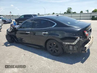 2012 Infiniti M with VIN JN1BY1AR4CM393490, listed as a Copart auction lot 60292295 with 322,907 mi miles and Salvage title. Bid and sale history available at DreamBid. Image 2.