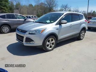 2015 Ford Escape SE with VIN 1FMCU9GX0FUB99881, listed as a IAAI auction lot 42114415 with 138,561 mi miles. Bid and sale history available at carsss.com. Image 2.