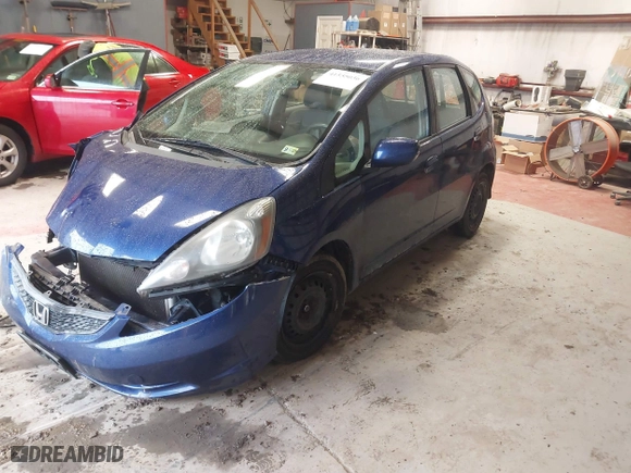 2013 Honda Fit with VIN JHMGE8H33DC025099, listed as a IAAI auction lot 41555036 with 128,522 mi miles. Bid and sale history available at carsss.com. Image 17.