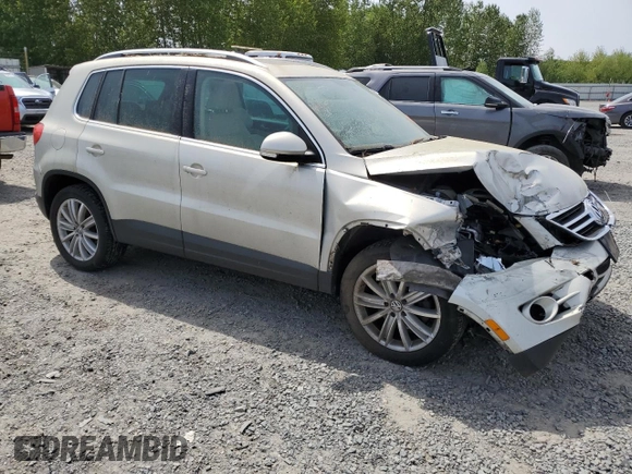2011 Volkswagen Tiguan SEL z VIN WVGBV7AX6BW559854, wystawiony jako Copart lot #56268195 z przebiegiem 107 428 mil mil oraz Czysty tytuł • Clean title. Historia ofert i sprzedaży dostępna na DreamBid. Obrazek 4.