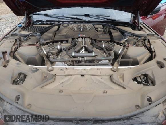 2021 BMW M8 z VIN WBSGV0C03MCF60039, wystawiony jako Copart lot #39737763 z przebiegiem Nie podano mil oraz . Historia ofert i sprzedaży dostępna na DreamBid. Obrazek 11.