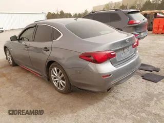 2015 Infiniti M35h Hybrid with VIN JN1EY1AP2FM510029, listed as a IAAI auction lot 41795913 with 152,475 mi miles. Bid and sale history available at carsss.com. Image 3.