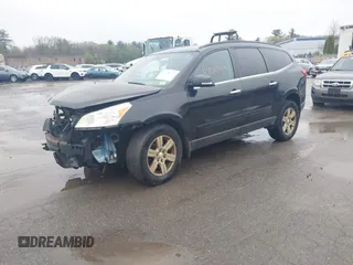 2011 Chevrolet Traverse 1LT with VIN 1GNKVGED9BJ164415, listed as a IAAI auction lot 42186793 with 186,769 mi miles and . Bid and sale history available at DreamBid. Image 2.
