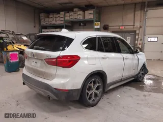 2016 BMW X1 xDrive28i with VIN WBXHT3C30G5E52065, listed as a IAAI auction lot 41552781 with 205,961 mi miles. Bid and sale history available at carsss.com. Image 4.