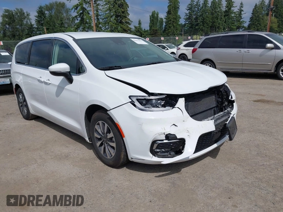 2023 Chrysler Pacifica Hybrid Touring L with VIN 2C4RC1L77PR541513, listed as a IAAI auction lot 42433421 with 53,979 mi miles and . Bid and sale history available at DreamBid. Image 1.