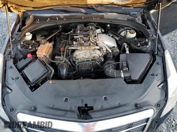 2015 Cadillac ATS Luxury AWD z VIN 1G6AH1RX2F0115326, wystawiony jako Copart lot #84489304 z przebiegiem 98 875 mil mil oraz Szkoda całkowita • Salvage title. Historia ofert i sprzedaży dostępna na DreamBid. Obrazek 11.