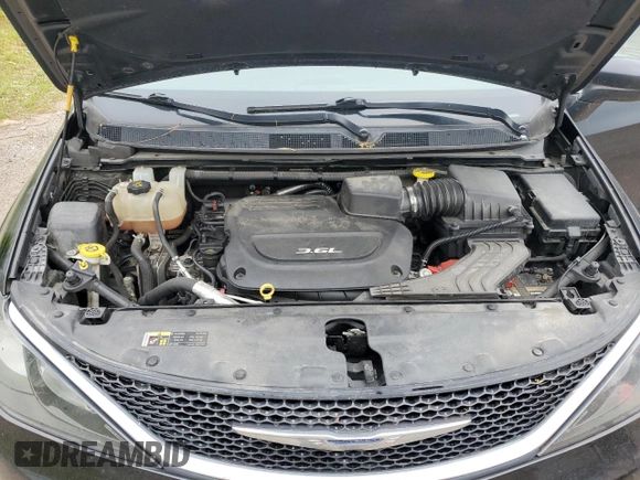 2017 Chrysler Pacifica Touring with VIN 2C4RC1DG0HR638357, listed as a Copart auction lot 59319465 with 100,921 mi miles and Clean title. Bid and sale history available at DreamBid. Image 12.