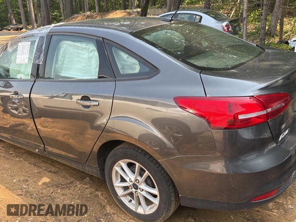 2017 Ford Focus SE with VIN 1FADP3F23HL200927, listed as a Copart auction lot 60996055 with Not provided miles and Clean title. Bid and sale history available at DreamBid. Image 8.