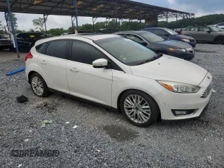 2016 Ford Focus Titanium with VIN 1FADP3N22GL292399, listed as a Copart auction lot 63033385 with 180,653 mi miles and Clean title. Bid and sale history available at DreamBid. Image 4.