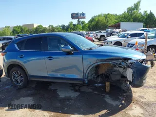 2020 Mazda CX-5 Touring z VIN JM3KFBCM2L0848233, wystawiony jako IAAI lot #42189719 z przebiegiem 80 893 mil mil oraz . Historia ofert i sprzedaży dostępna na DreamBid. Obrazek 14.