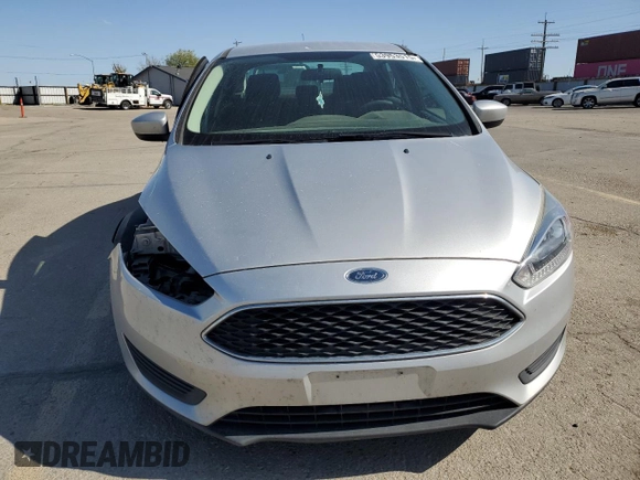 2018 Ford Focus SE z VIN 1FADP3F29JL206110, wystawiony jako Copart lot #53953515 z przebiegiem 80 841 mil mil oraz Szkoda całkowita • Salvage title. Historia ofert i sprzedaży dostępna na DreamBid. Obrazek 5.
