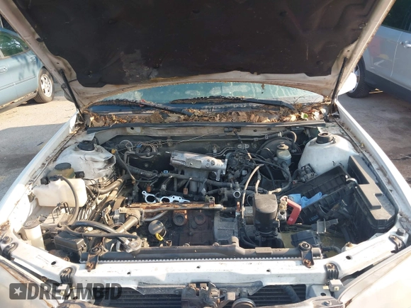 2001 Toyota Camry CE with VIN JT2BG22K010570556, listed as a IAAI auction lot 42458031 with 357,046 mi miles and . Bid and sale history available at DreamBid. Image 10.