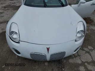 2006 Pontiac Solstice z VIN 1G2MB33B56Y106095, wystawiony jako Copart lot #79906094 z przebiegiem 54 475 mil mil oraz Szkoda całkowita • Salvage title. Historia ofert i sprzedaży dostępna na DreamBid. Obrazek 12.