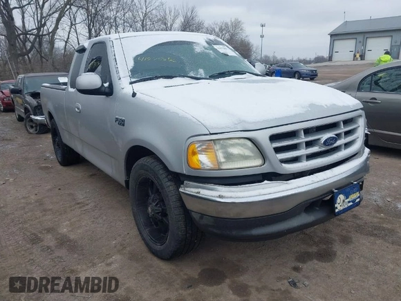 2002 Ford F-150 XL with VIN 1FTRX17212NA45843, listed as a IAAI auction lot 41575856 with 136,570 mi miles. Bid and sale history available at carsss.com. Image 1.