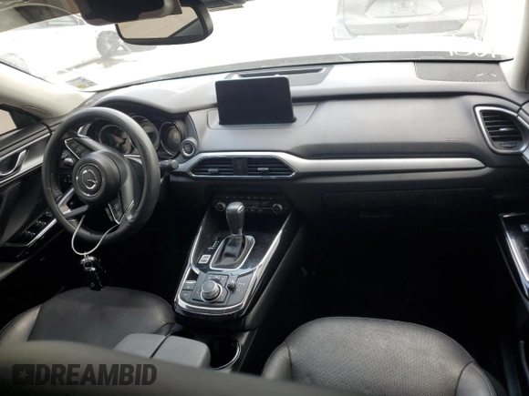 2020 Mazda CX-9 Touring with VIN JM3TCACY1L0423340, listed as a Copart auction lot 57389305 with 64,737 mi miles and Salvage title. Bid and sale history available at DreamBid. Image 8.