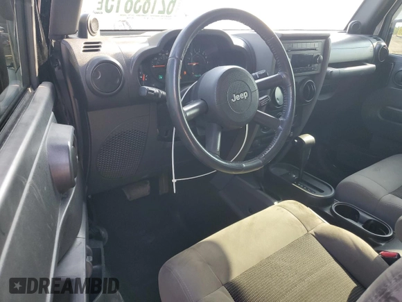 2009 Jeep Wrangler X with VIN 1J4FA24159L772540, listed as a Copart auction lot 62183815 with 179,628 mi miles and Salvage title. Bid and sale history available at DreamBid. Image 8.