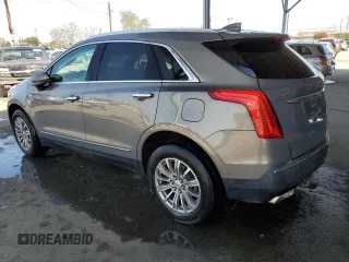2019 Cadillac XT5 Luxury FWD z VIN 1GYKNCRS4KZ221304, wystawiony jako Copart lot #54995415 z przebiegiem 128 940 mil mil oraz Szkoda całkowita • Salvage title. Historia ofert i sprzedaży dostępna na DreamBid. Obrazek 2.