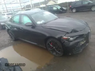 2020 Alfa Romeo Giulia Ti Sport z VIN ZARFANBN2L7629757, wystawiony jako IAAI lot #37940163 z przebiegiem 39 048 mil mil oraz . Historia ofert i sprzedaży dostępna na DreamBid. Obrazek 1.