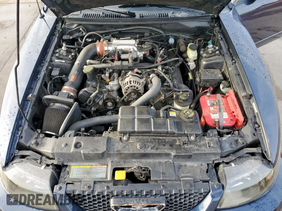 2001 Ford Mustang GT Deluxe z VIN 1FAFP42X41F139883, wystawiony jako Copart lot #50243745 z przebiegiem 142 545 mil mil oraz Szkoda całkowita • Salvage title. Historia ofert i sprzedaży dostępna na DreamBid. Obrazek 11.