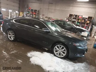 2015 Chevrolet Impala LT with VIN 2G1125S33F9100149, listed as a IAAI auction lot 41584560 with 268,947 mi miles. Bid and sale history available at carsss.com. Image 1.