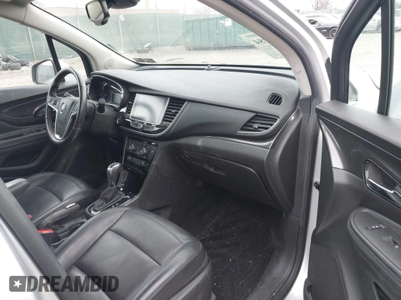 2019 Buick Encore Essence with VIN KL4CJGSM9KB858376, listed as a IAAI auction lot 41695284 with 82,267 mi miles. Bid and sale history available at carsss.com. Image 5.