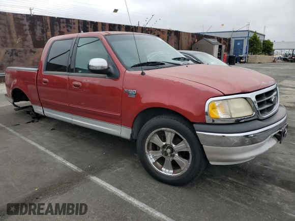 2001 Ford F-150 XLT with VIN 1FTRW07WX1KE51166, listed as a Copart auction lot 60164025 with 157,035 mi miles and Salvage title. Bid and sale history available at DreamBid. Image 4.