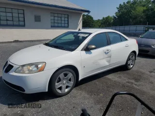 2009 Pontiac G6 1SA with VIN 1G2ZG57B094190187, listed as a Copart auction lot 66873185 with 113,087 mi miles and Salvage title. Bid and sale history available at DreamBid. Image 1.