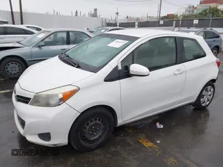 2014 Toyota Yaris L with VIN JTDJTUD34ED576939, listed as a IAAI auction lot 41805971 with 234,406 mi miles. Bid and sale history available at carsss.com. Image 2.