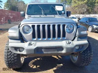 2019 Jeep Wrangler Unlimited Sport S with VIN 1C4HJXDN4KW599466, listed as a IAAI auction lot 41407578 with 77,312 mi miles. Bid and sale history available at carsss.com. Image 11.