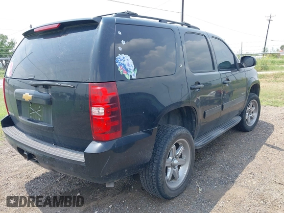 2014 Chevrolet Tahoe LT with VIN 1GNSCBE08ER193058, listed as a IAAI auction lot 42382232 with 228,749 mi miles and . Bid and sale history available at DreamBid. Image 4.