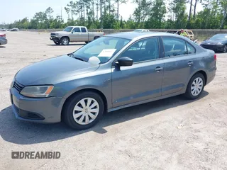 2014 Volkswagen Jetta S with VIN 3VW2K7AJ2EM328671, listed as a IAAI auction lot 42603027 with 156,137 mi miles and . Bid and sale history available at DreamBid. Image 2.