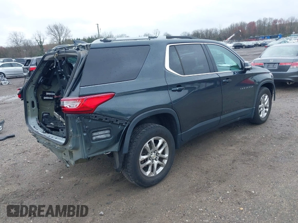 2018 Chevrolet Traverse LT Cloth z VIN 1GNEVGKW7JJ156198, wystawiony jako IAAI lot #41909259 z przebiegiem 82 719 mil mil oraz . Historia ofert i sprzedaży dostępna na DreamBid. Obrazek 4.