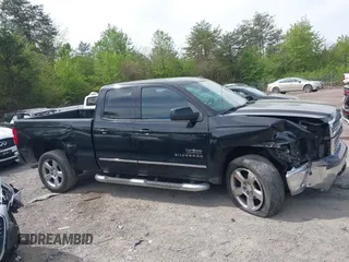 2014 Chevrolet Silverado 1500 LT with VIN 1GCRCREH3EZ138815, listed as a IAAI auction lot 41883354 with 214,630 mi miles. Bid and sale history available at carsss.com. Image 13.