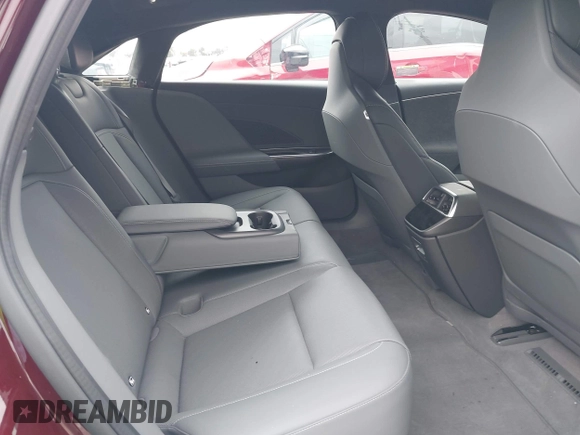 2023 Lucid Air Pure z VIN 50EA1PFA4PA006331, wystawiony jako IAAI lot #42213426 z przebiegiem 13 287 mil mil oraz . Historia ofert i sprzedaży dostępna na DreamBid. Obrazek 8.