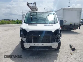 2015 Ford Transit Cargo with VIN 1FTNR1ZM9FKA50724, listed as a IAAI auction lot 42506872 with 155,117 mi miles and . Bid and sale history available at DreamBid. Image 13.