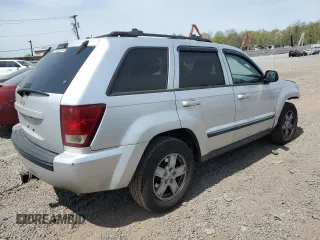 2007 Jeep Grand Cherokee Laredo z VIN 1J8GR48K77C658109, wystawiony jako Copart lot #54685615 z przebiegiem 183 692 mil mil oraz Szkoda całkowita • Salvage title. Historia ofert i sprzedaży dostępna na DreamBid. Obrazek 3.