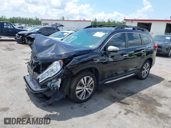 2022 Subaru Ascent Touring with VIN 4S4WMARDXN3463890, listed as a IAAI auction lot 42359804 with 26,713 mi miles and . Bid and sale history available at DreamBid. Image 2.