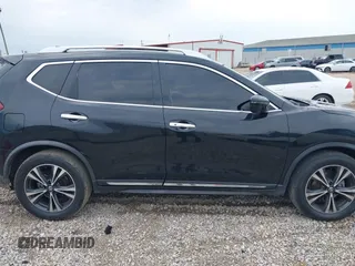 2018 Nissan Rogue SV with VIN JN8AT2MT8JW465012, listed as a IAAI auction lot 39376292 with 184,861 mi miles and . Bid and sale history available at DreamBid. Image 13.